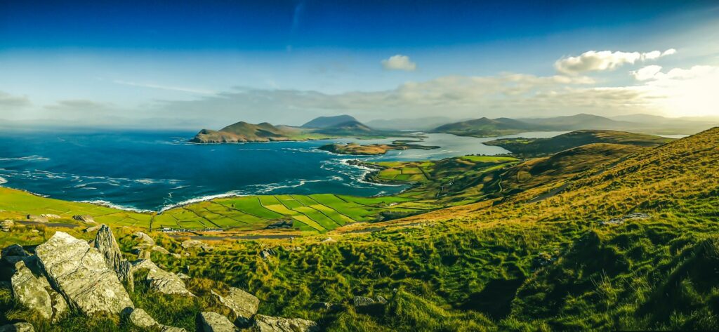 View of Kerry coast and the sun shining down. GO solar for climate change in Ireland.