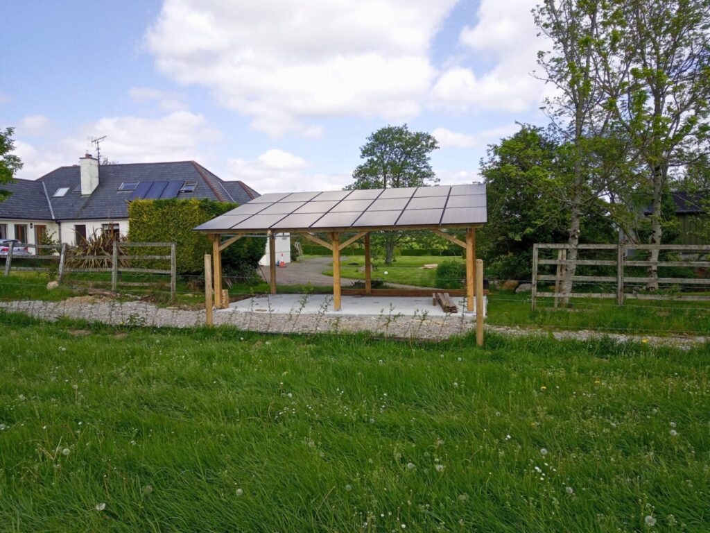 An outside gazebo fitted with solar panels by SolarSmart and Solar Structures in Ireland.